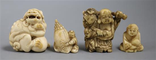 A group of four Japanese ivory or bone netsuke, late 19th/early 20th century